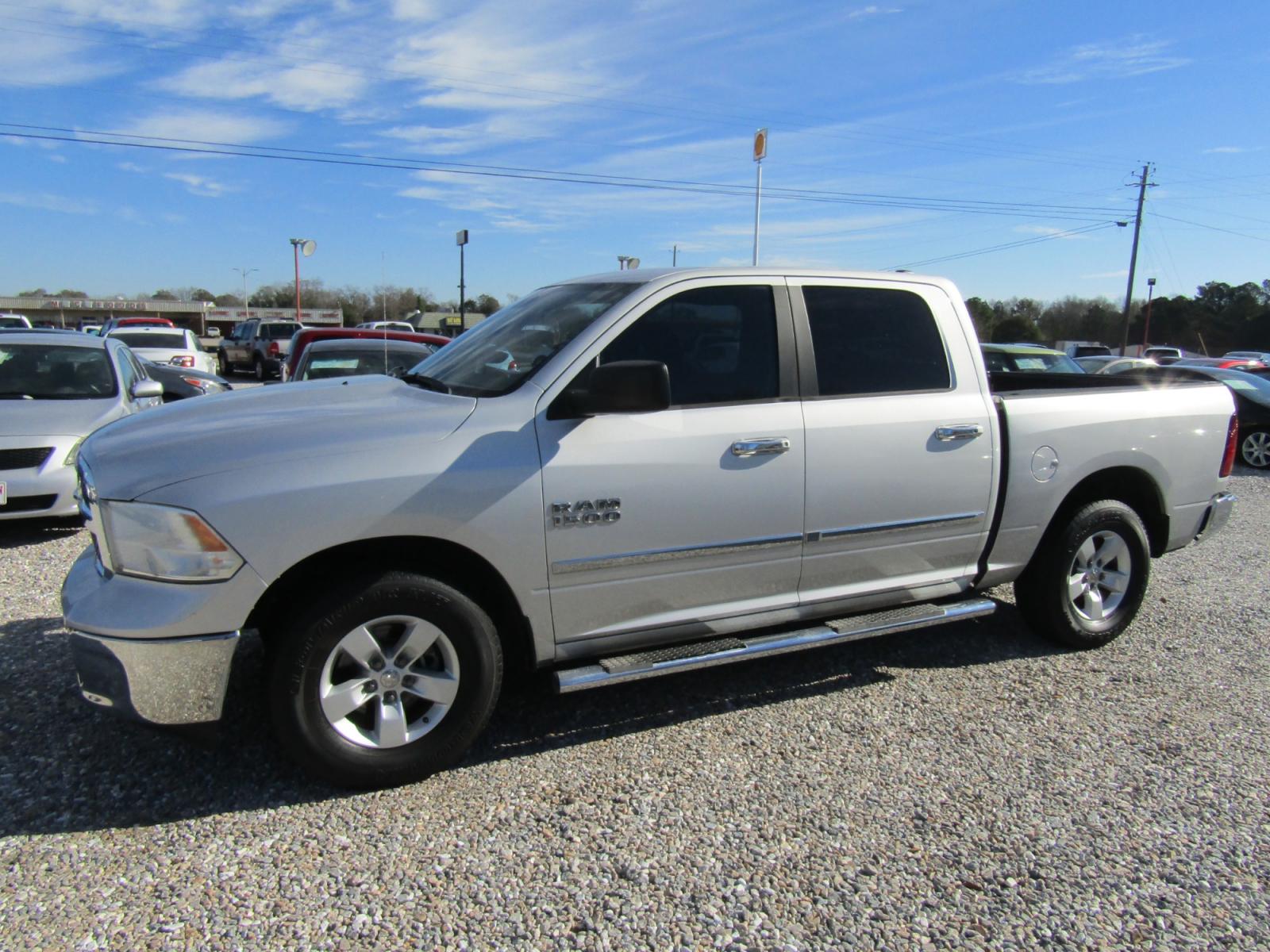 2013 Silver RAM 1500 SLT Crew Cab 2WD (1C6RR6LG9DS) with an 3.6L V6 engine, Automatic transmission, located at 15016 S Hwy 231, Midland City, AL, 36350, (334) 983-3001, 31.306210, -85.495277 - Photo #2